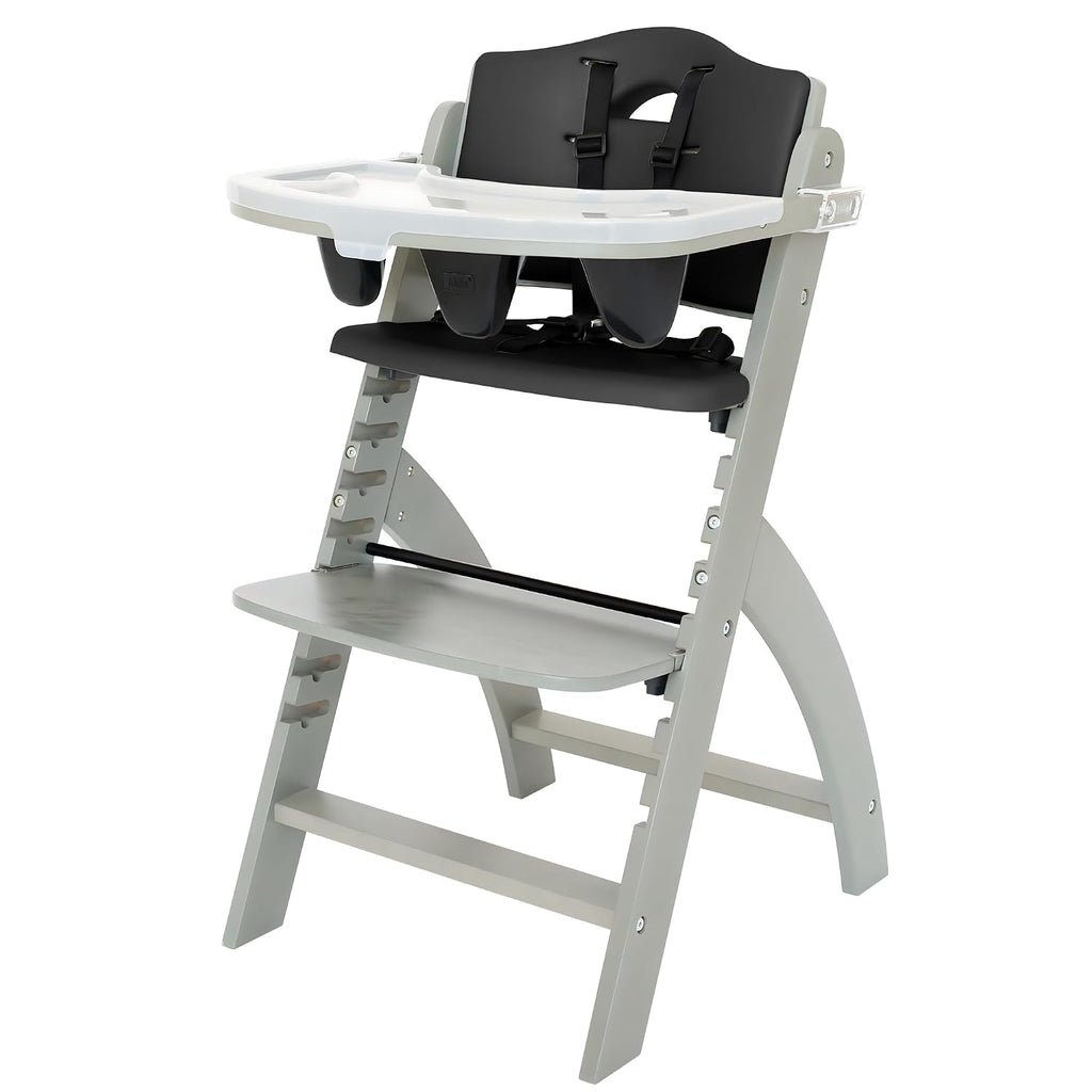 Abiie Beyond Junior Wooden High Chair for Babies and Toddlers - Convertible 3-in-1 Baby Highchair with Removable Tray - 6 Months to 250 Lb - Water Resistant - Misty Grey Wood/Black Pearl Cushion