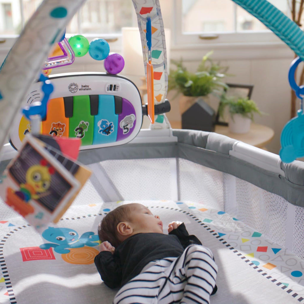 Baby Einstein Kick & Snooze 3-in-1 Foldable Playard, Bassinet and Musical Play Gym, Includes Fitted Sheet, 3-Step Easy Fold, Piano Toy with 25+ Minutes of Music, Grows with Baby, Ages 0 Months and Up