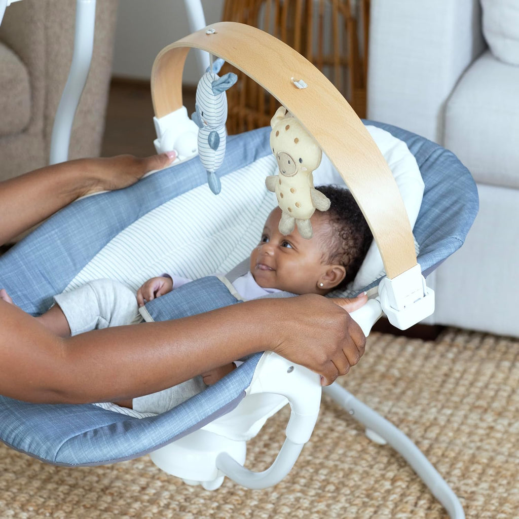 Ingenuity SimpleComfort Compact Baby Swing, Rotating Seat Swings in 3 Directions, 6 Speeds, 8 Melodies & 3 Nature Sounds, Ages 0-9 Months, Up to 20 Pounds - Chambray