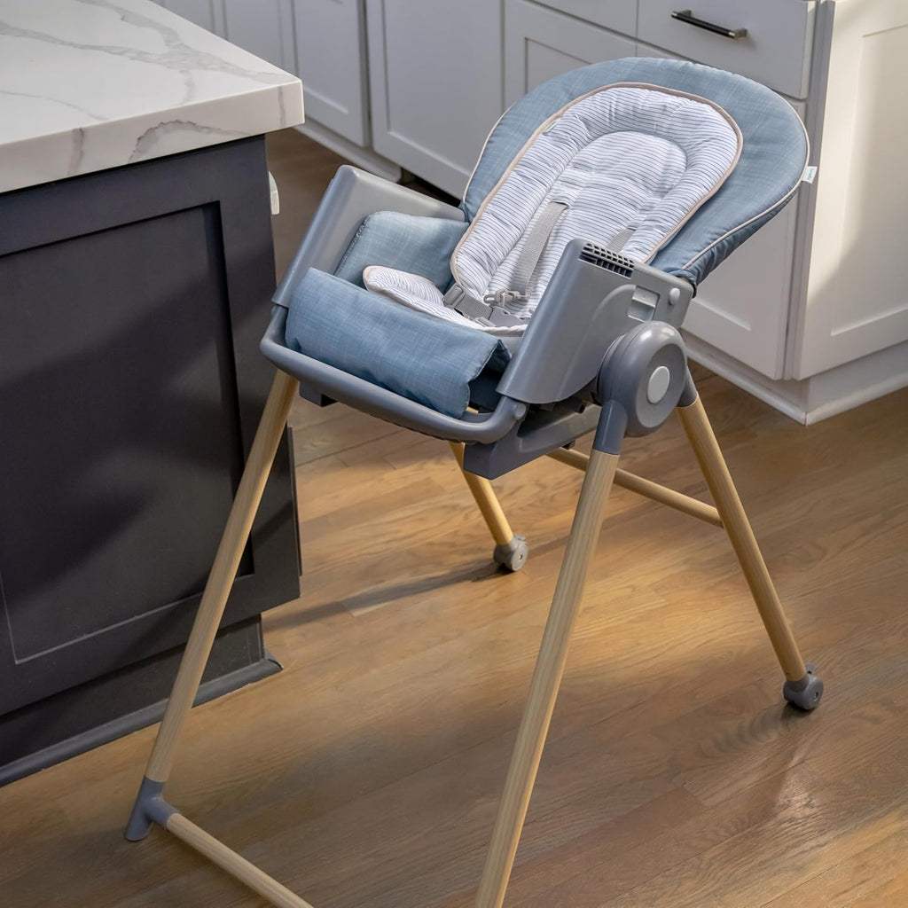 Ingenuity Proper Positioner Deluxe High Chair - 7-in-1 Convertible Baby Seat, Faux Wood Print Legs, Unisex, for Ages 0-36 Months