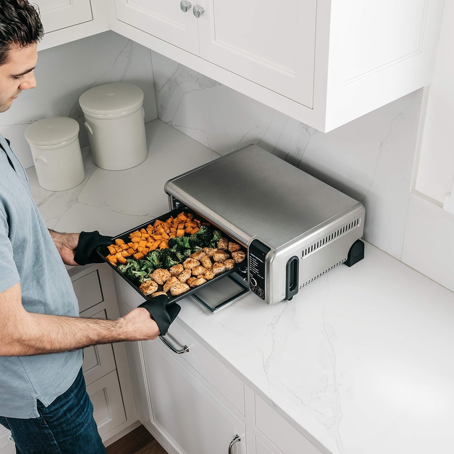 Ninja Digital Air Fryer & Toaster Oven | 8-in-1 Functionality | Flip-Up Design | XL Capacity | Air Fry Basket, Sheet Pan, Wire Rack & Crumb Tray | 1800 Watt | Silver | SP101