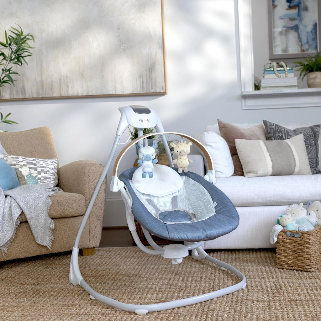 Ingenuity SimpleComfort Compact Baby Swing, Rotating Seat Swings in 3 Directions, 6 Speeds, 8 Melodies & 3 Nature Sounds, Ages 0-9 Months, Up to 20 Pounds - Chambray