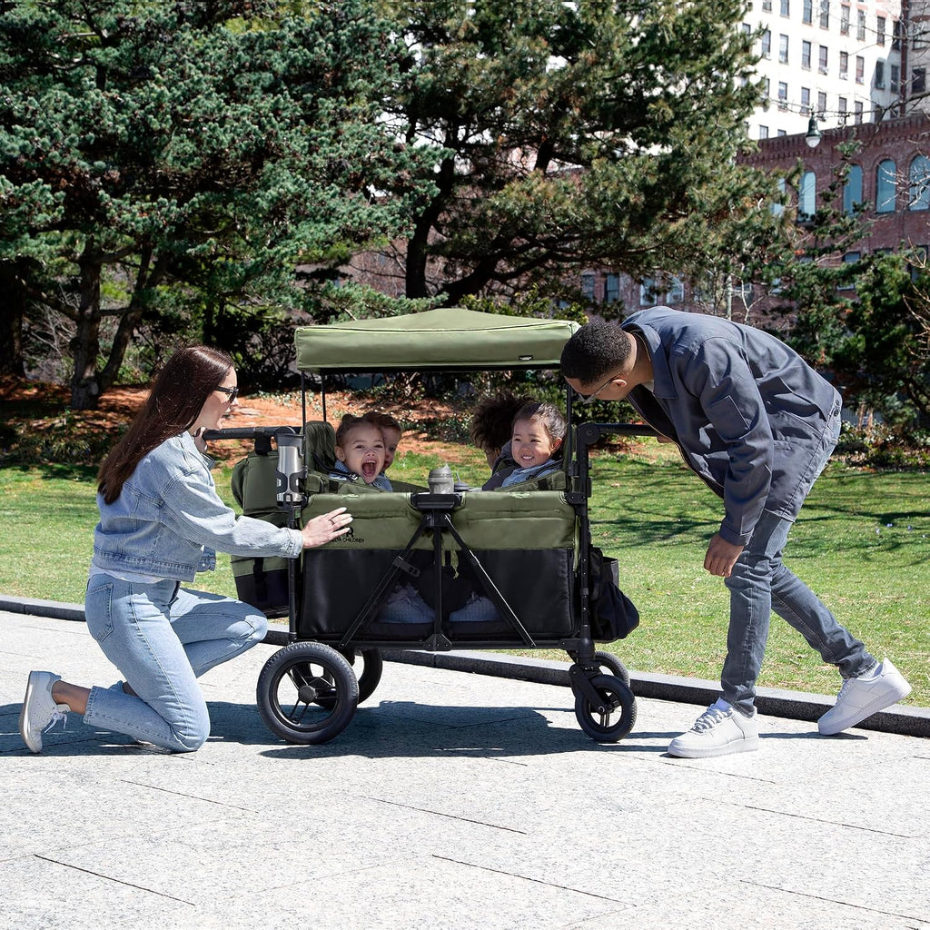 Delta Children - Jeep Wrangler Deluxe 4 Seater Stroller Wagon - Premium Quad Stroller Wagon for 4 Kids with Convertible Seats, Adjustable Push/Pull Handles, Removable Canopy & Flat Fold, Black/Green