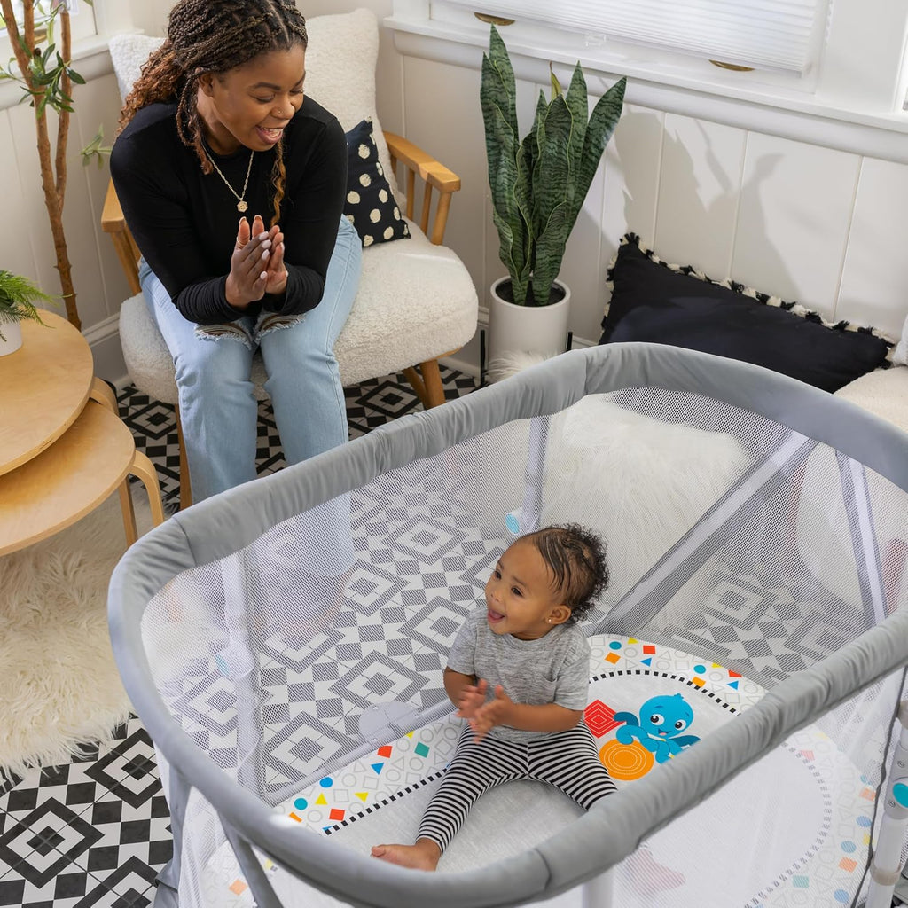 Baby Einstein Kick & Snooze 3-in-1 Foldable Playard, Bassinet and Musical Play Gym, Includes Fitted Sheet, 3-Step Easy Fold, Piano Toy with 25+ Minutes of Music, Grows with Baby, Ages 0 Months and Up
